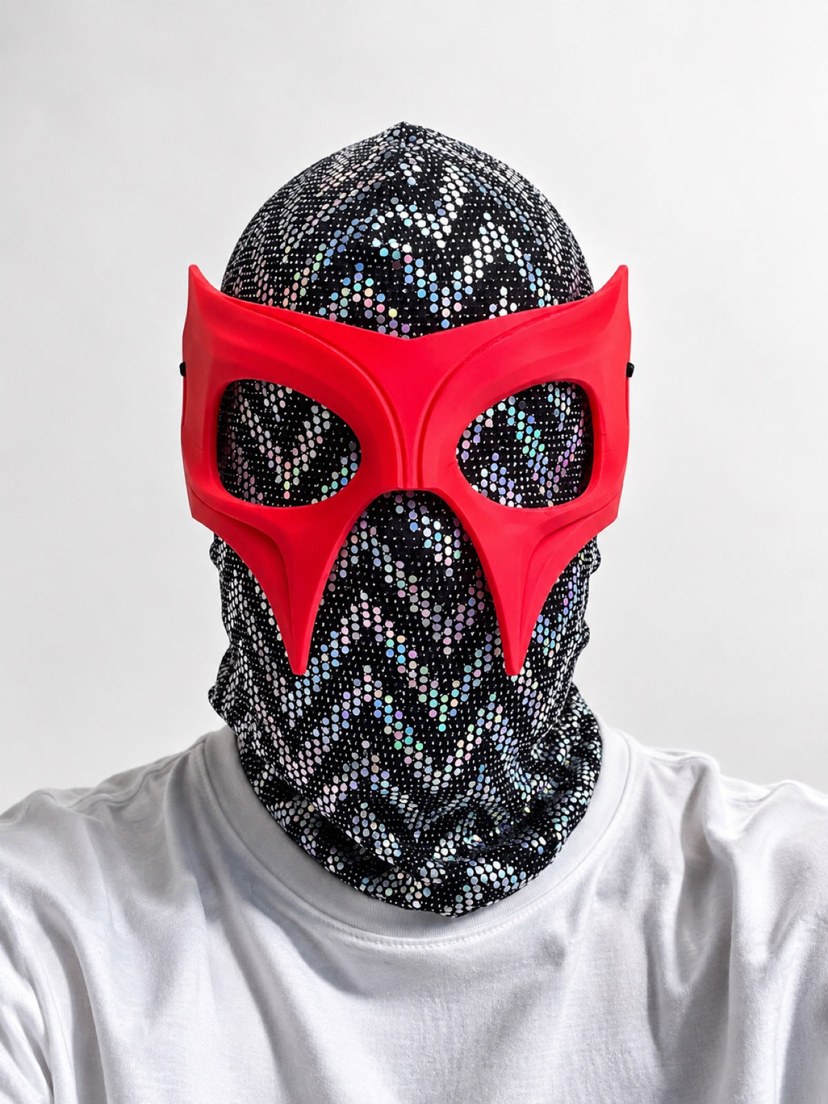 OTKYDACH DYNASTY red 3D printed plastic mask worn over a holographic balaclava — balaclava not included