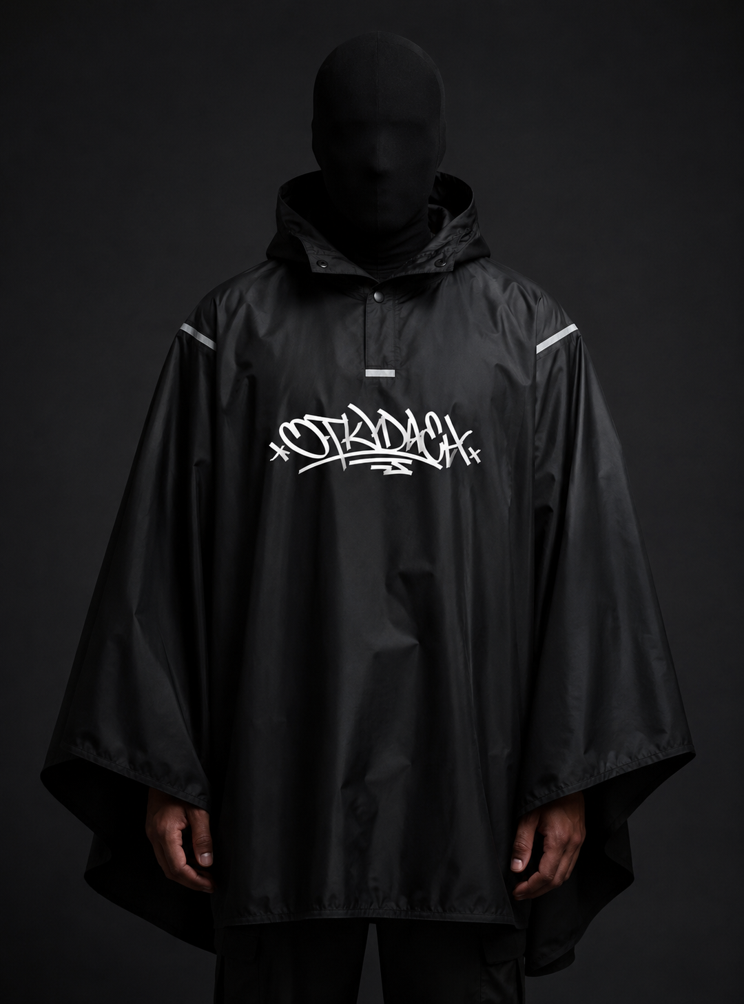 Black OTKYDACH waterproof hooded rain poncho with white graffiti logo, front view