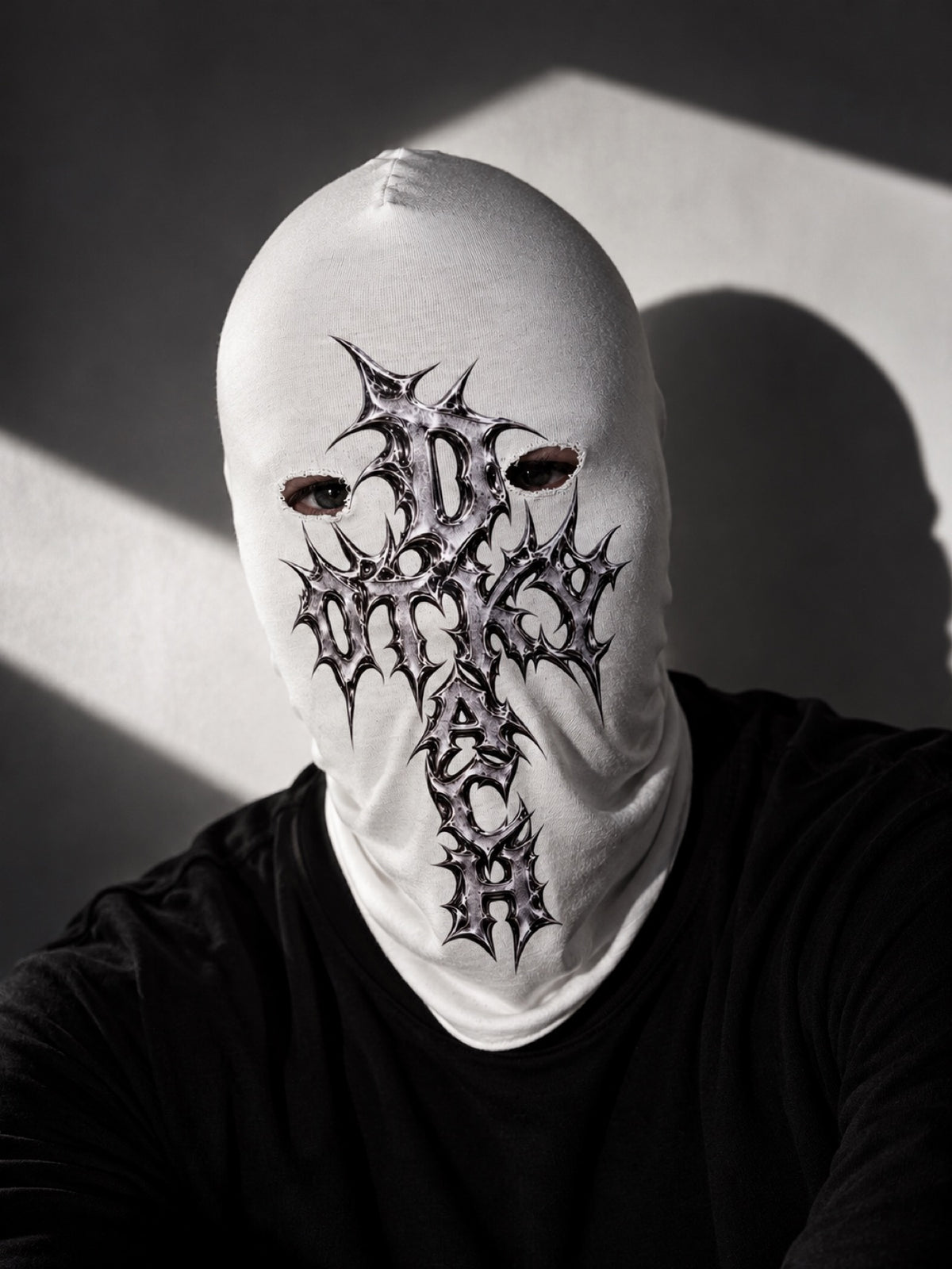 White gothic balaclava mask with chrome-inspired print in dramatic studio lighting — alternative streetwear full face fashion mask by OTKYDACH