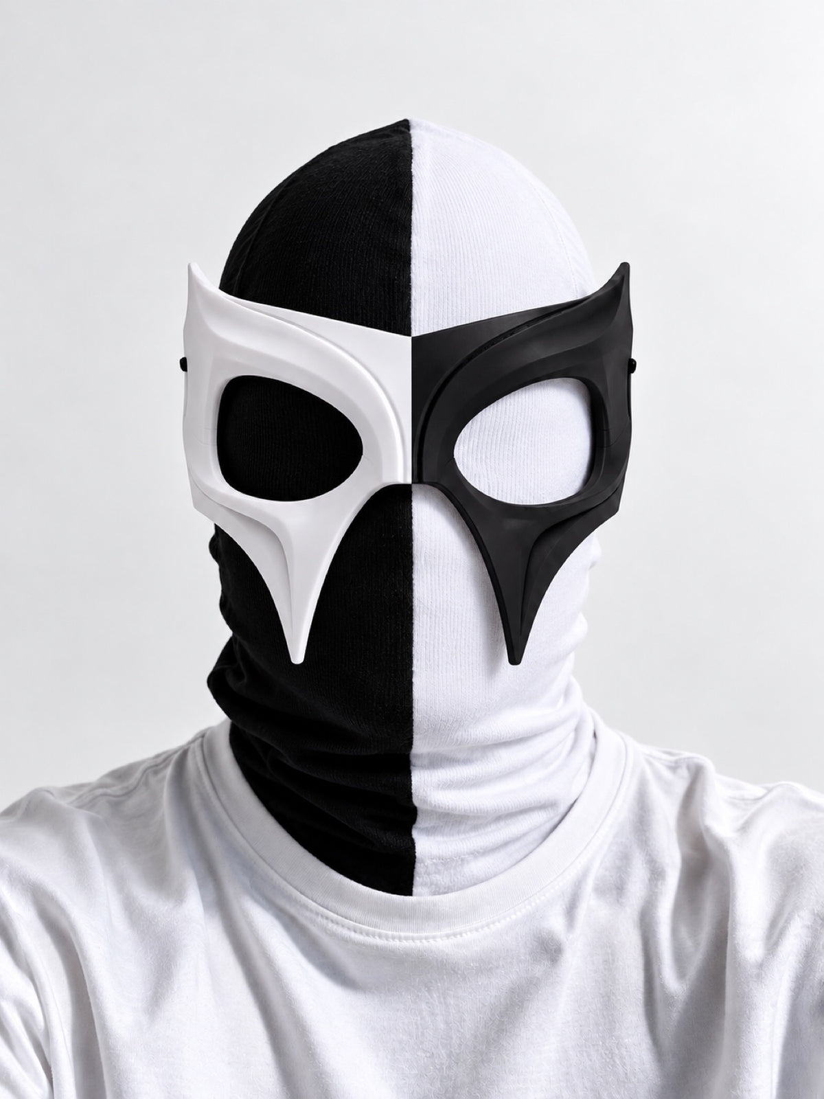 OTKYDACH DYNASTY Half-Half black and white 3D printed plastic mask worn over a two-tone balaclava — balaclava not included
